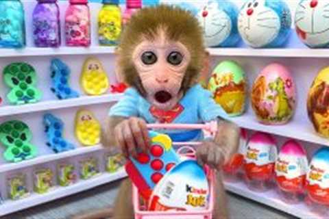 Monkey Baby Bon Bon buys surprise eggs in supermarket and eats lollipops in his house